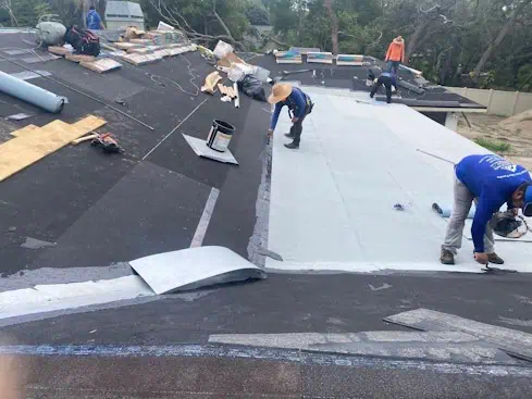 The roofing company crew working on roof in tampa